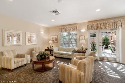A cozy living room with elegant furniture and soft lighting.