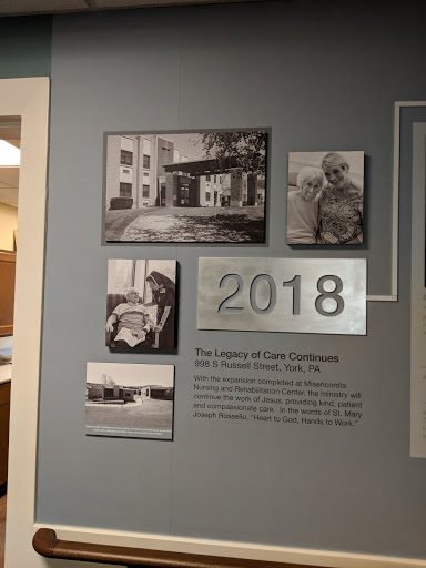 A display from a historical exhibition showcasing significant events and photos from the year 2018.