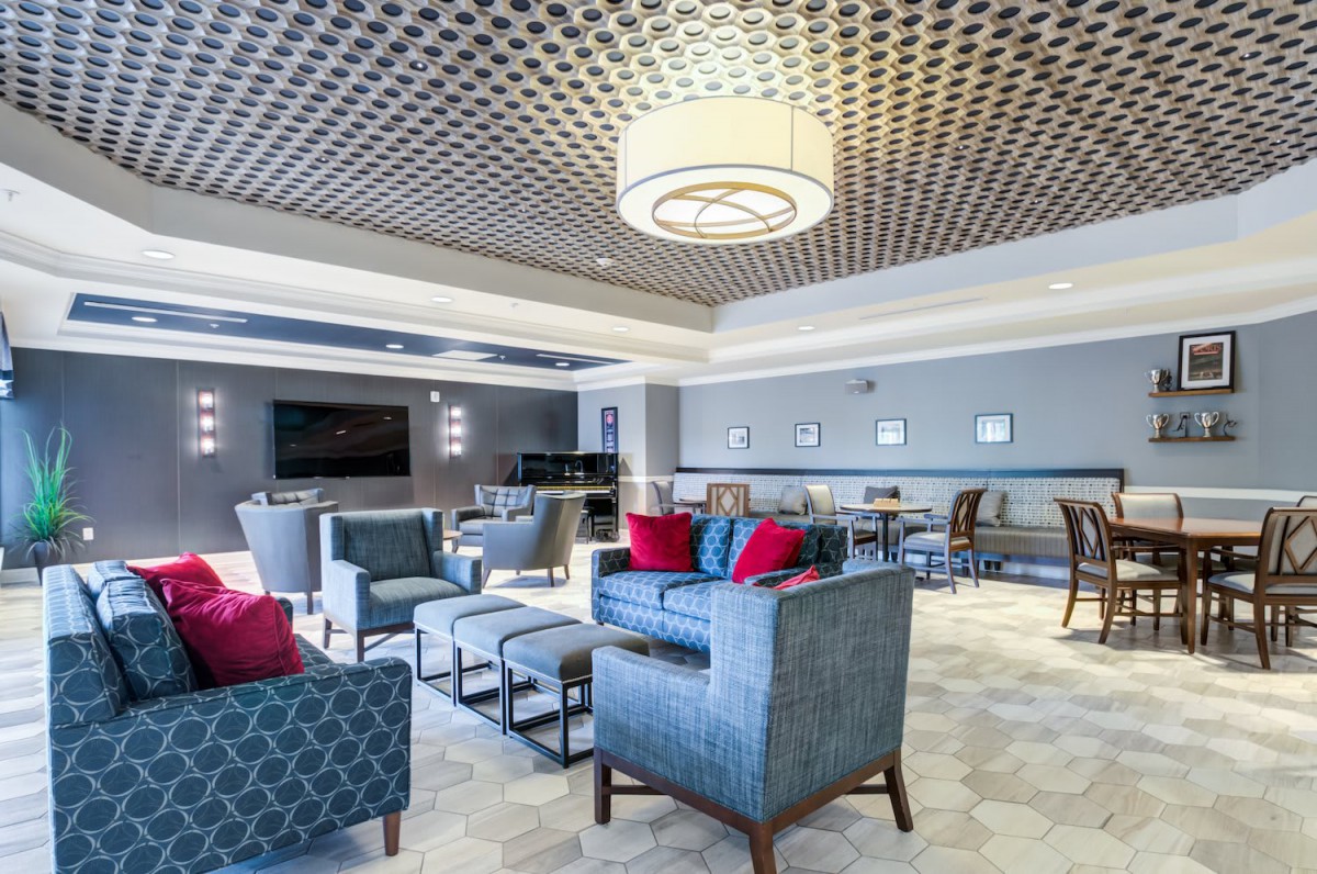 A modern lounge area featuring stylish seating and ambient lighting.