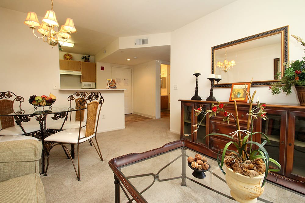A cozy living space featuring a dining area with elegant furniture and stylish home decor.