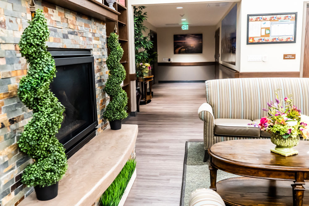 Cozy lounge area with a fireplace and comfortable seating.