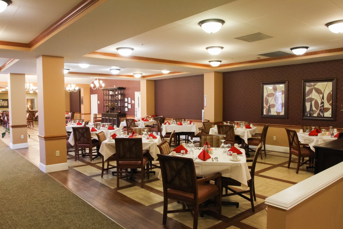 An elegant restaurant dining area with neatly arranged tables and stylish decor.