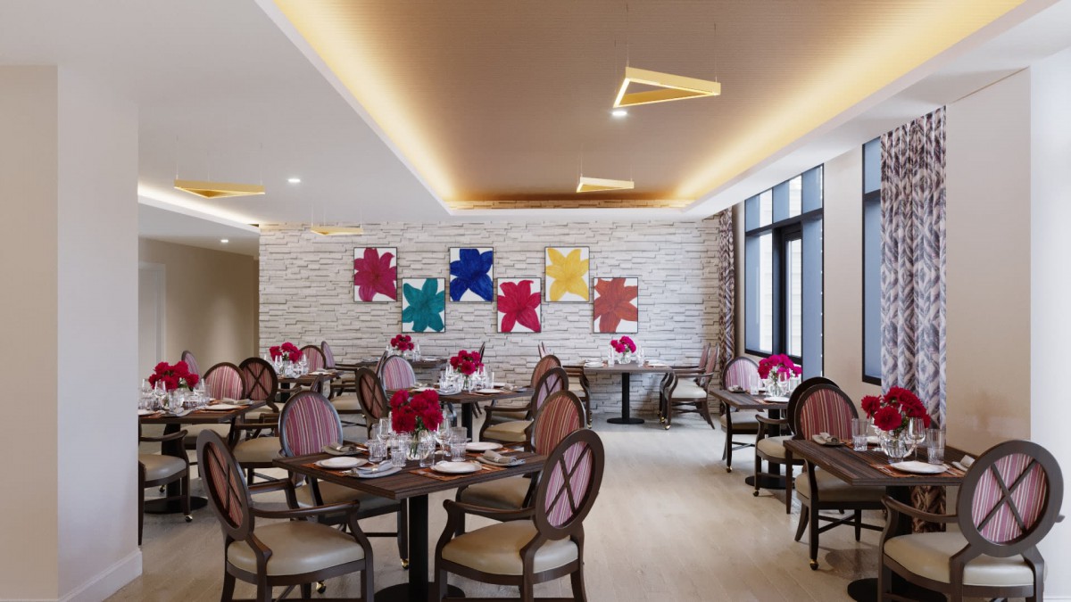 A stylish restaurant dining area featuring elegant seating and vibrant artwork.