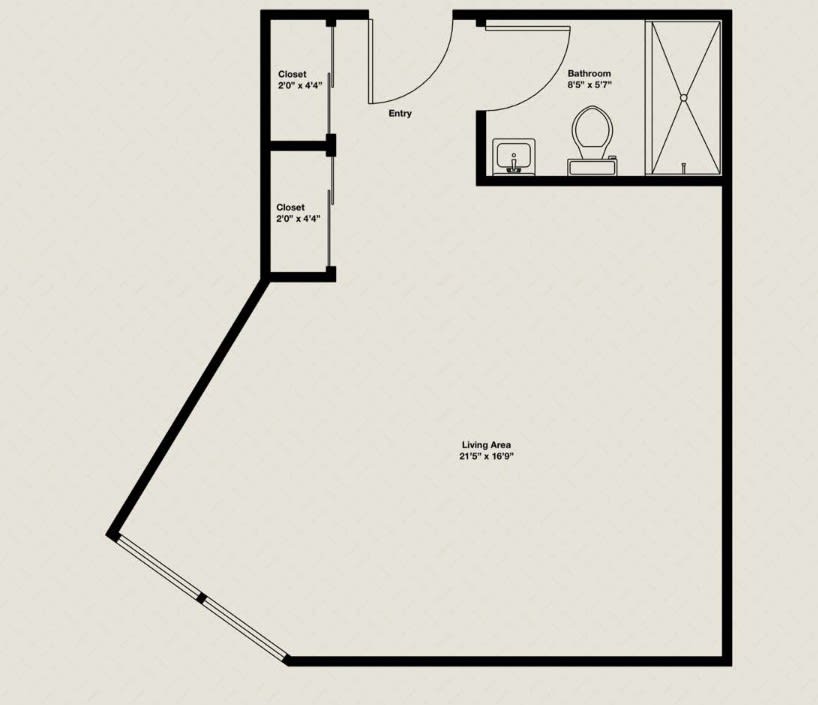 A simple floor plan showing a single room with an adjoining bathroom and closet.