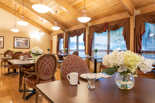 A cozy dining area with elegant decor and natural light.