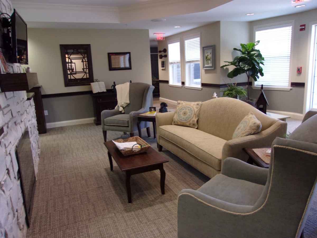 A cozy living room with comfortable seating and tasteful decor.