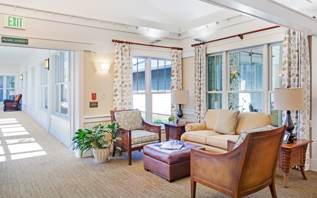 A cozy living room with comfortable seating and natural light.