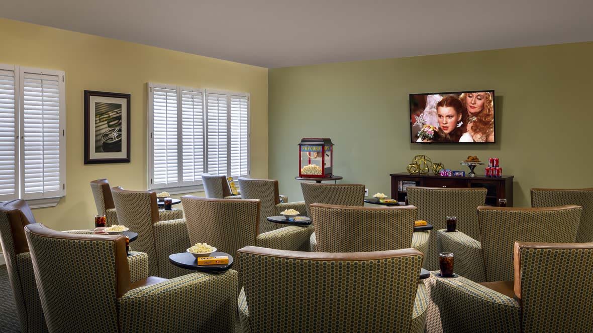 Cozy home theater setup with comfortable seating and popcorn.