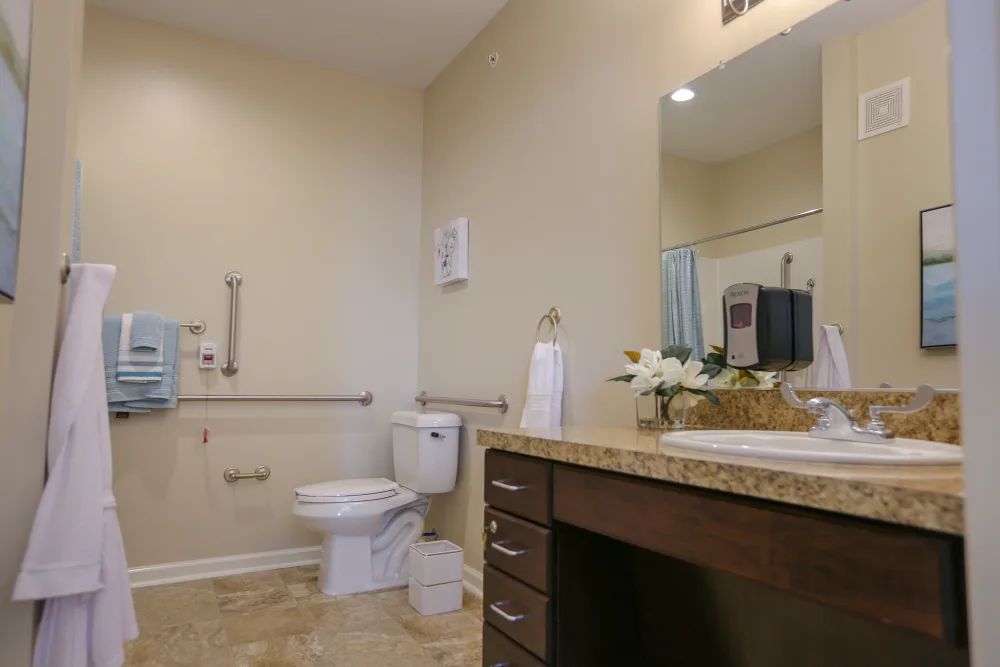 A clean and well-organized bathroom with essential fixtures.