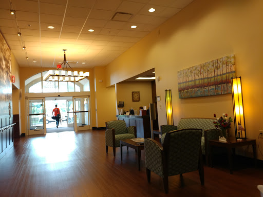 A bright and inviting lobby area with comfortable seating and natural light.