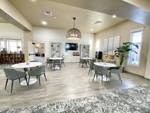 A modern and inviting lobby space featuring sleek furniture and tasteful decor.