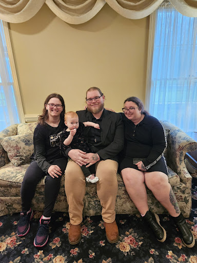 A cozy family moment captured on the couch.
