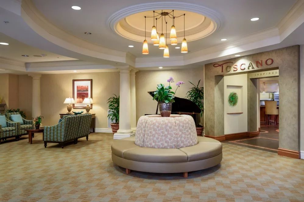 Elegant hotel lobby with comfortable seating and ambient lighting.