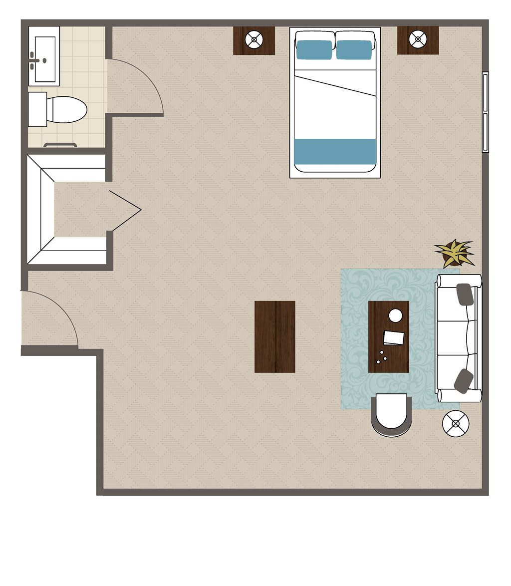 A simple floor plan illustrating a layout with a bedroom, bathroom, and living area.