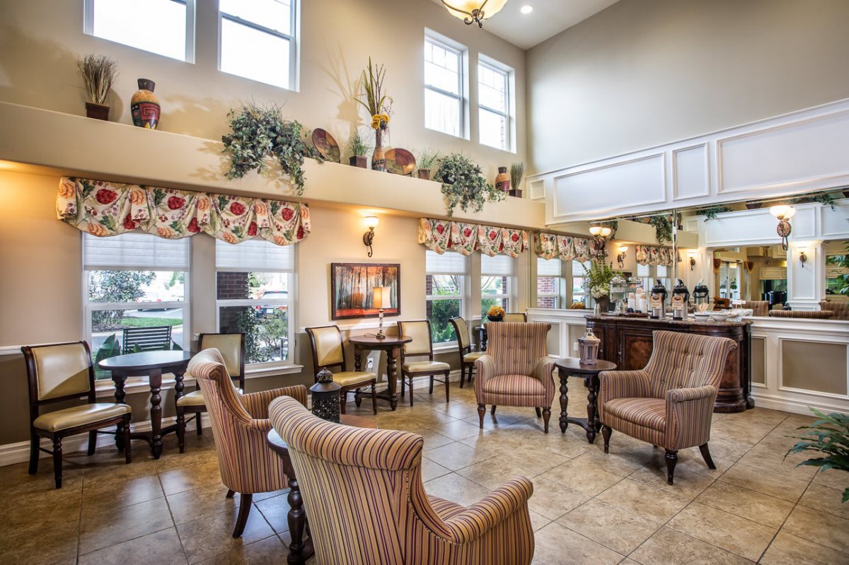 A spacious and well-lit lobby with comfortable seating and tasteful decor.