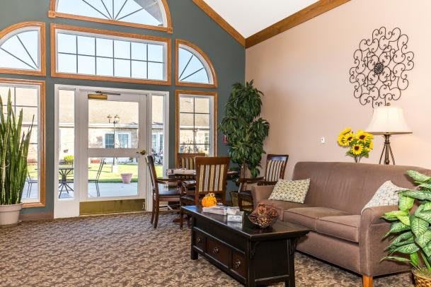 A cozy living room with elegant furnishings and abundant natural light.