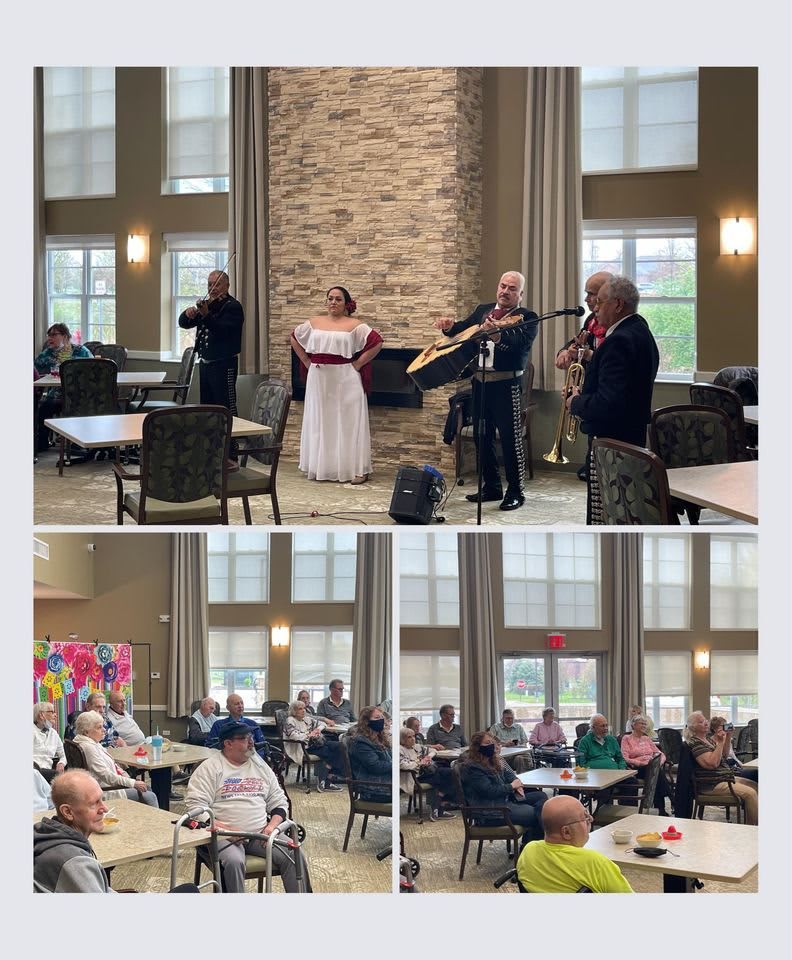 A musical performance in a spacious venue with an audience enjoying the event.