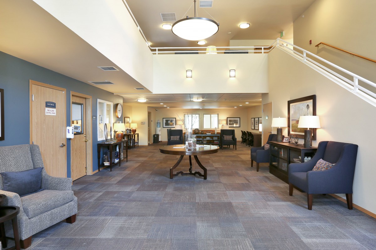 A spacious lobby area with comfortable seating and elegant lighting.