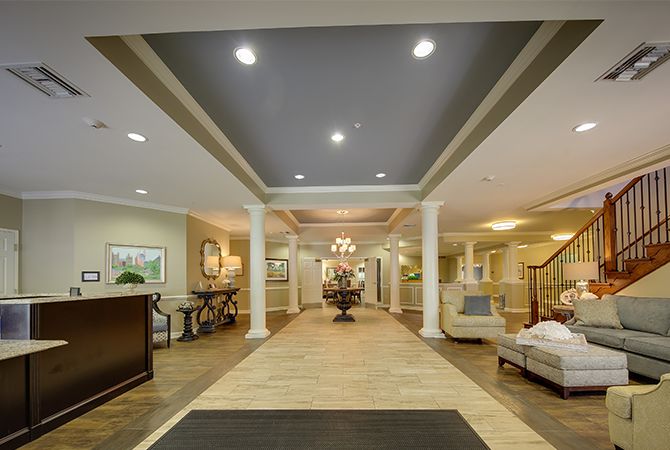A luxurious hotel lobby with elegant decor and comfortable seating.
