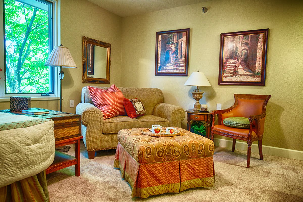 A cozy living room with comfortable seating and warm decor.