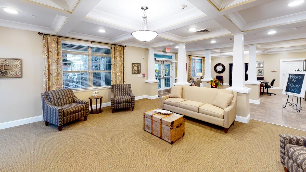 A cozy living room with comfortable seating and warm lighting.
