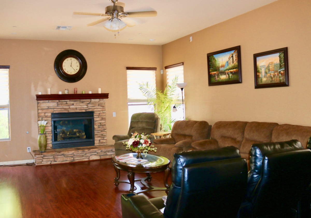 Cozy living room with a fireplace and comfortable seating.