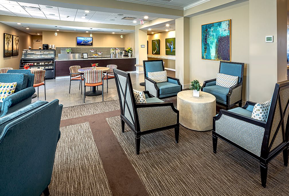 A modern waiting room with comfortable seating and stylish decor.