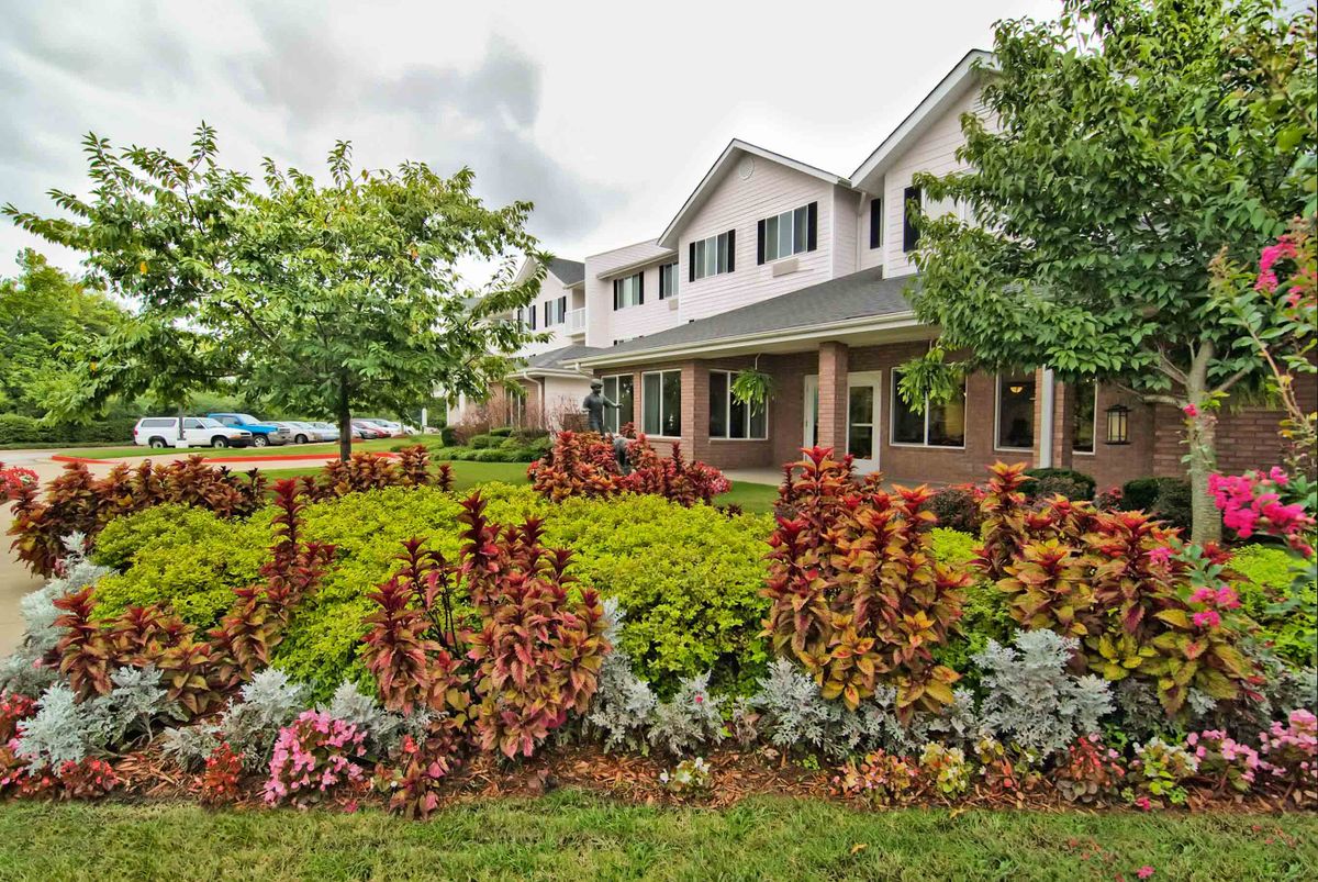 A well-maintained house with a beautifully landscaped garden.