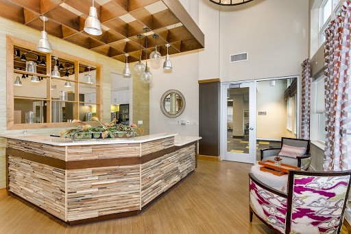 A modern reception area featuring natural wood elements and stylish decor.
