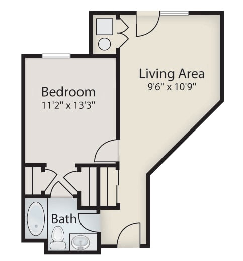 A floor plan of a small apartment with one bedroom, a bathroom, and a living area.