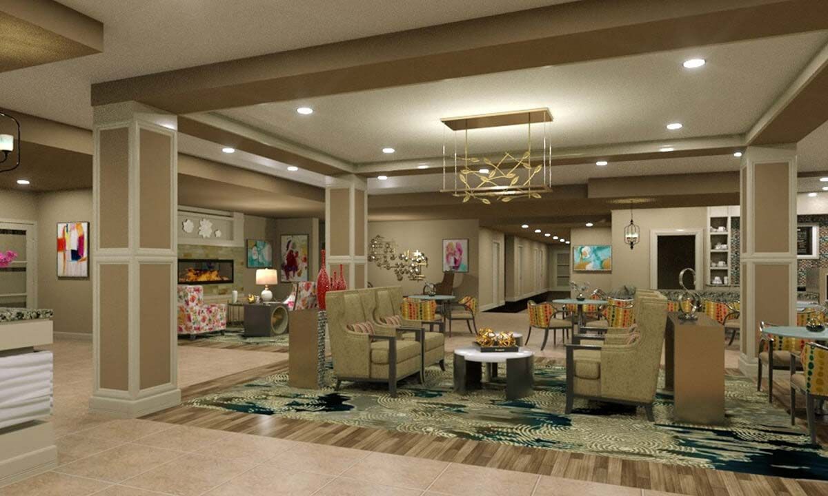 A modern lobby with comfortable seating, decorative lighting, and stylish decor.