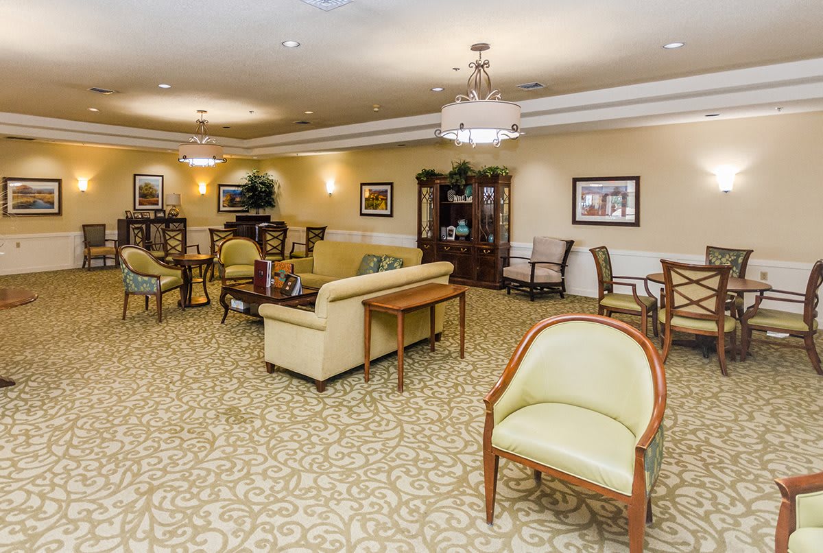 A spacious and elegantly decorated lobby with comfortable seating and warm lighting.