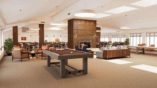 A spacious and modern lounge area featuring a billiards table, comfortable seating, and a warm fireplace, perfect for relaxation and social gatherings.