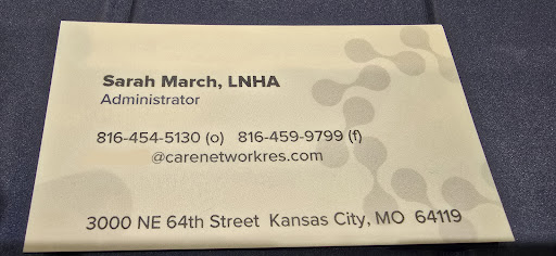 Business card of an administrator in the healthcare sector, featuring contact details and location.