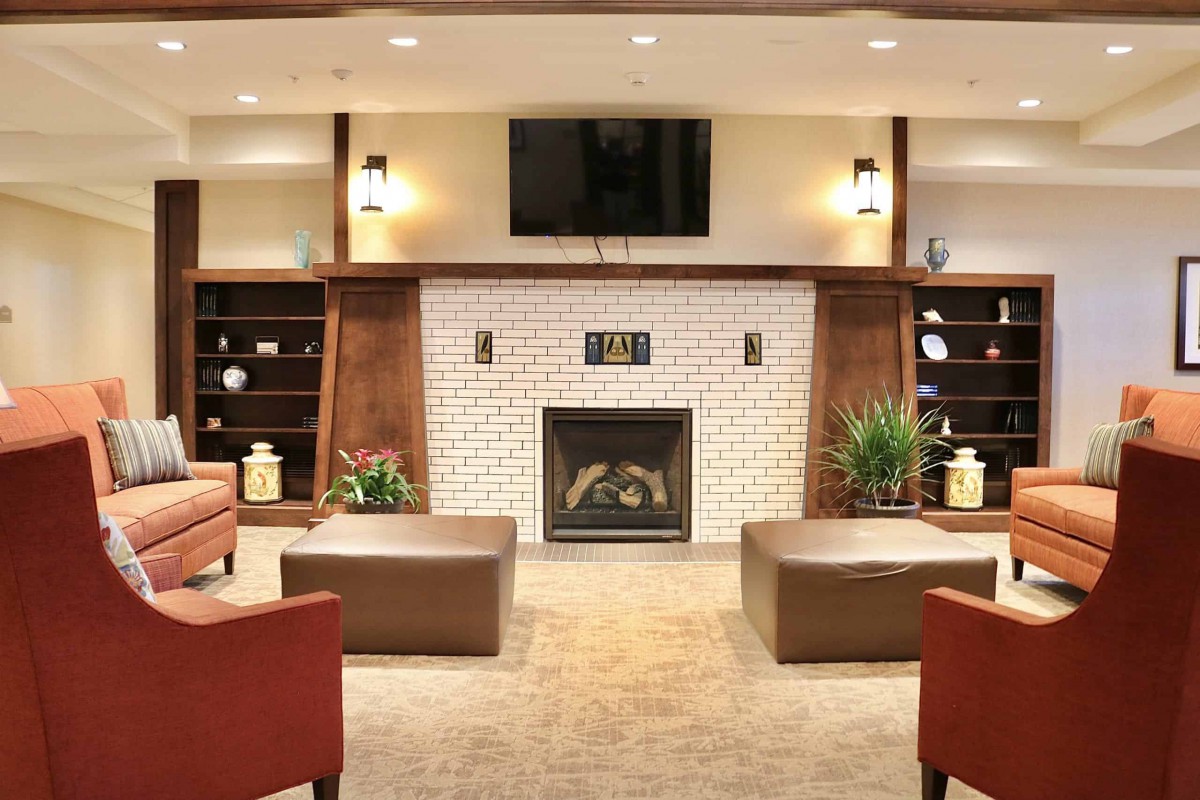 Cozy living room with a fireplace and comfortable seating.