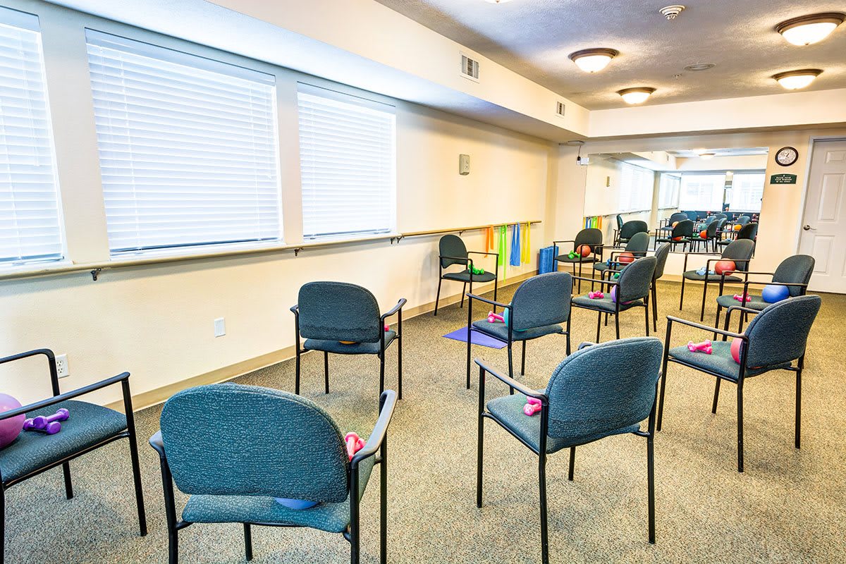 A conference room with chairs arranged for a meeting.