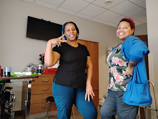 Two friends posing for a photo, sharing smiles and good vibes.