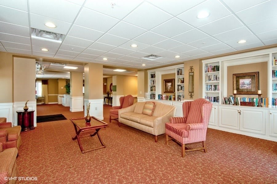 A cozy lobby area with comfortable seating and warm lighting.