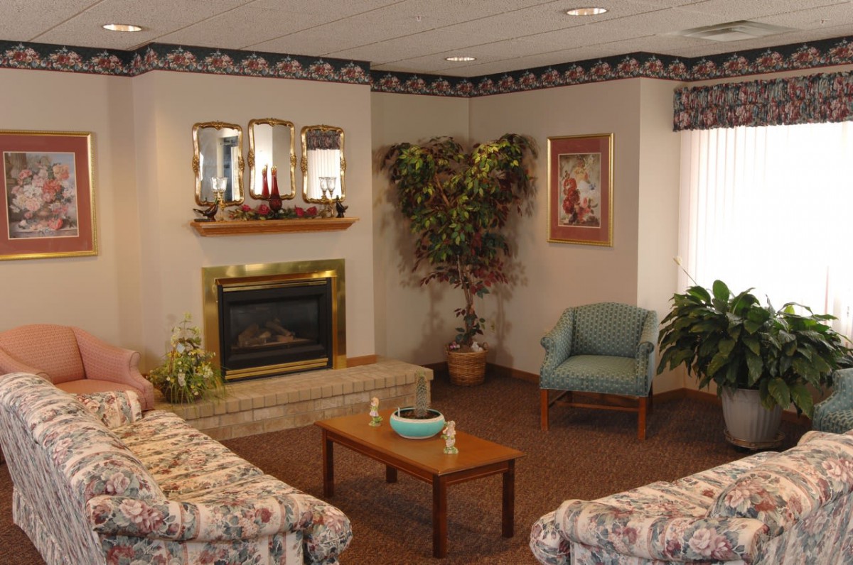 Cozy living room with a fireplace and comfortable seating.
