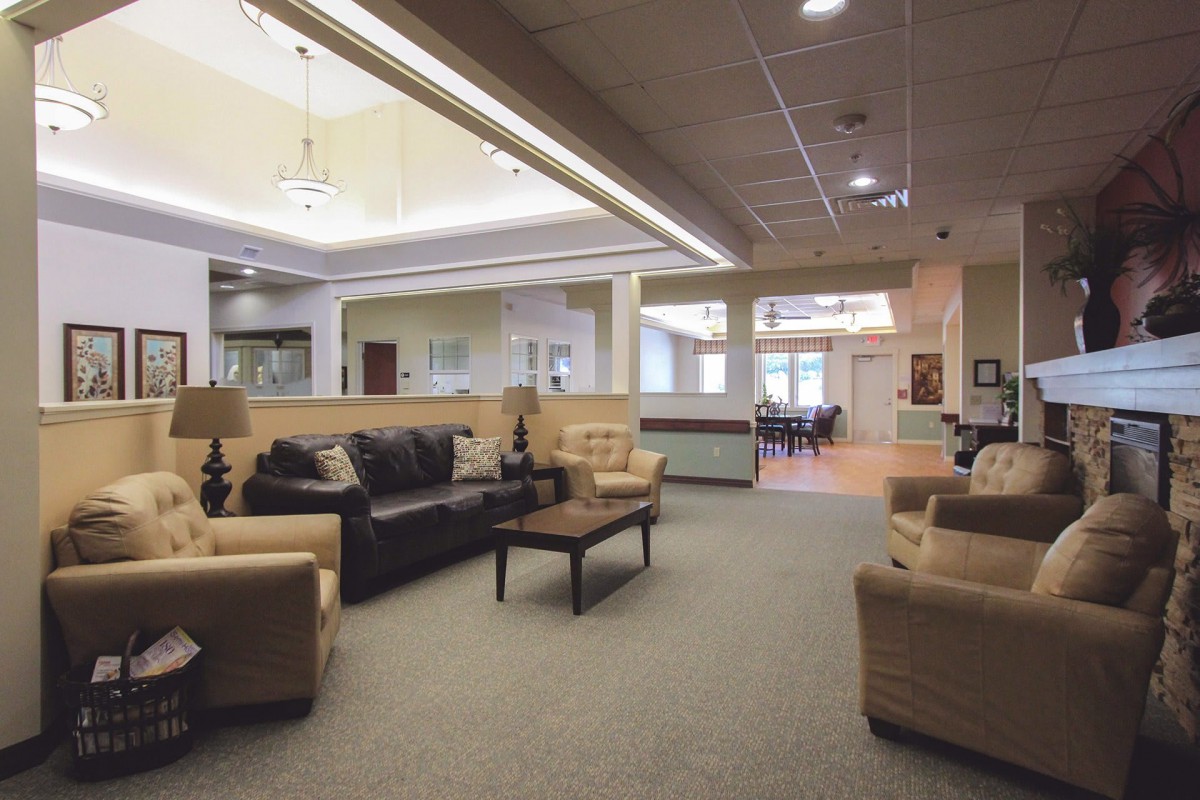 A modern living room with comfortable seating and elegant decor.