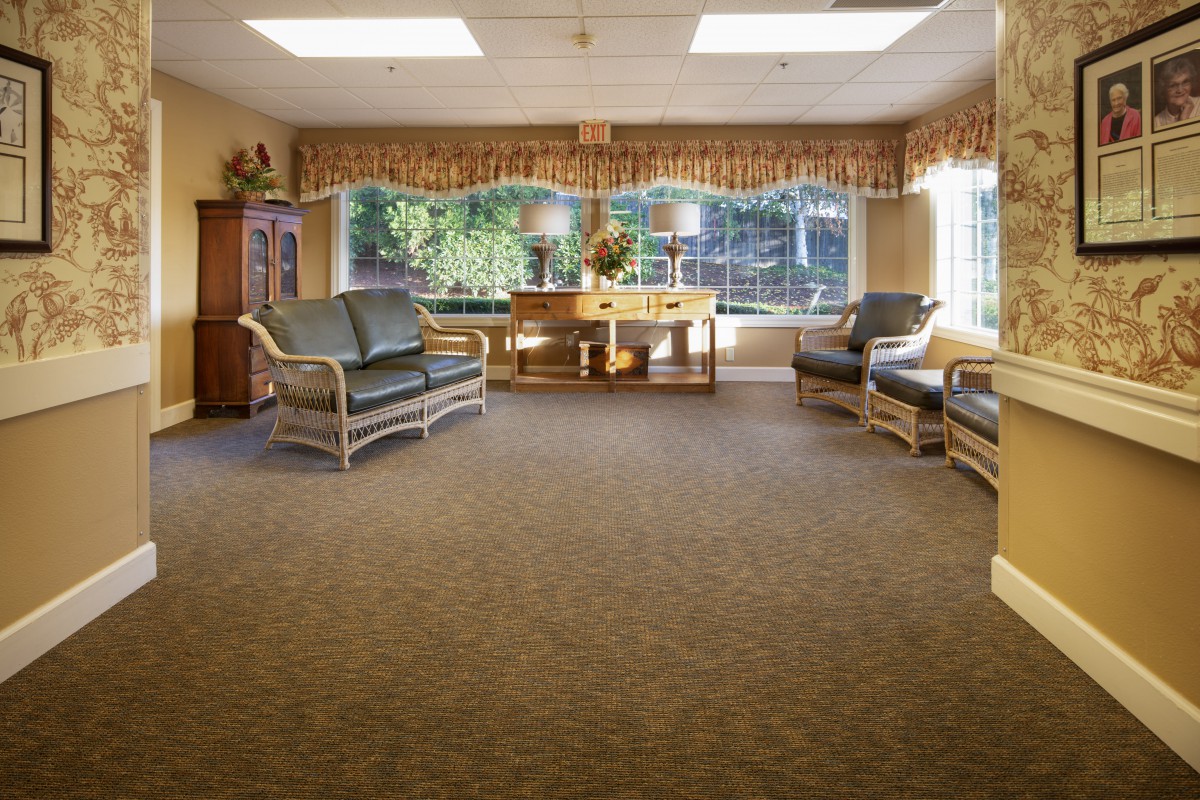 A cozy waiting room with comfortable seating and natural lighting.