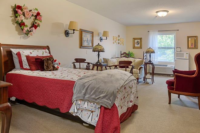 A cozy bedroom with a large bed and elegant decor.