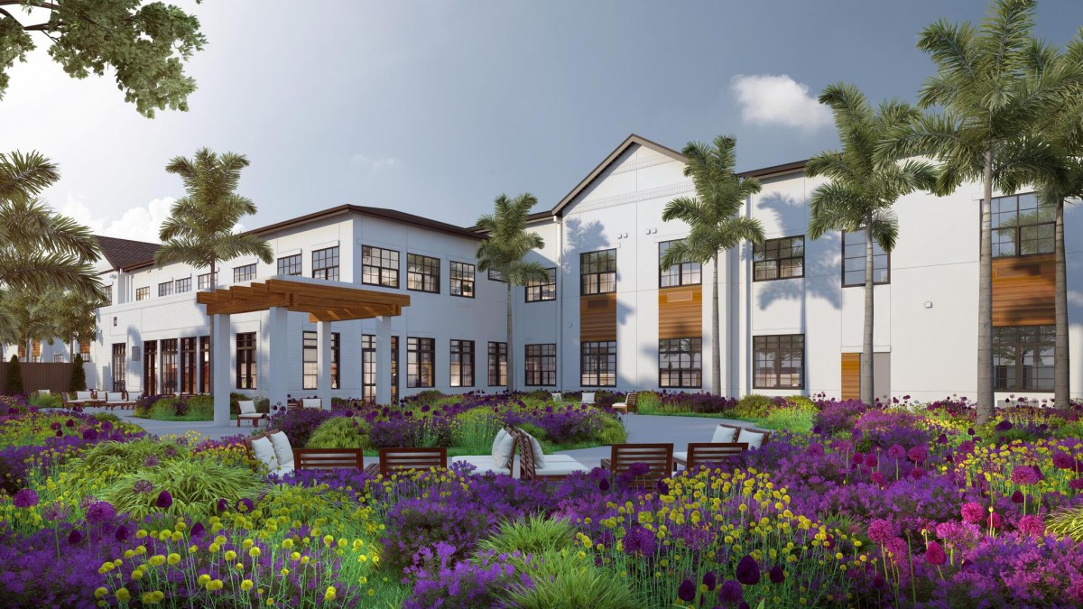 A luxurious house surrounded by a beautifully landscaped garden with vibrant flowers and palm trees.