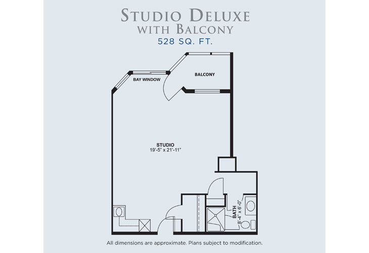 A floor plan of a Studio Deluxe apartment with a balcony measuring 528 sq. ft.