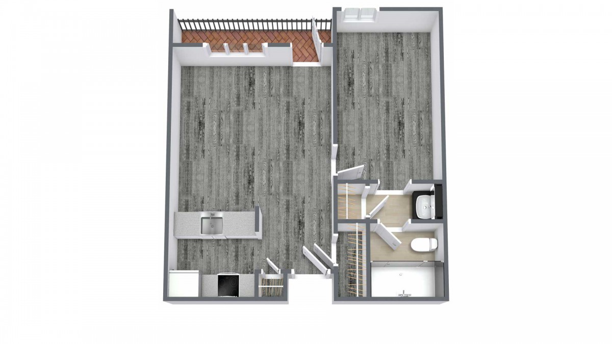 A floor plan of a one-bedroom apartment with an open living area and kitchen.