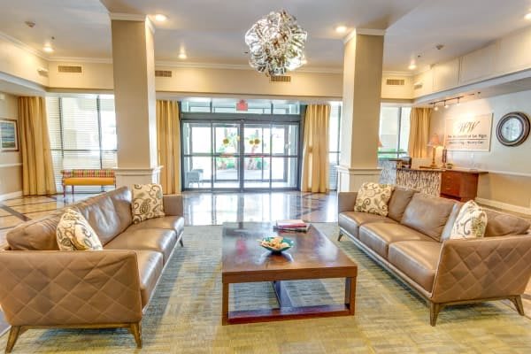 A modern hotel lobby with comfortable seating and elegant decor.