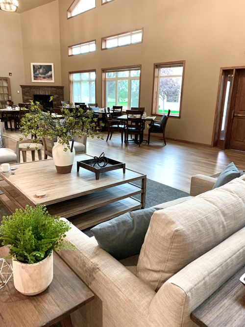 Modern living room with comfortable seating and stylish decor.