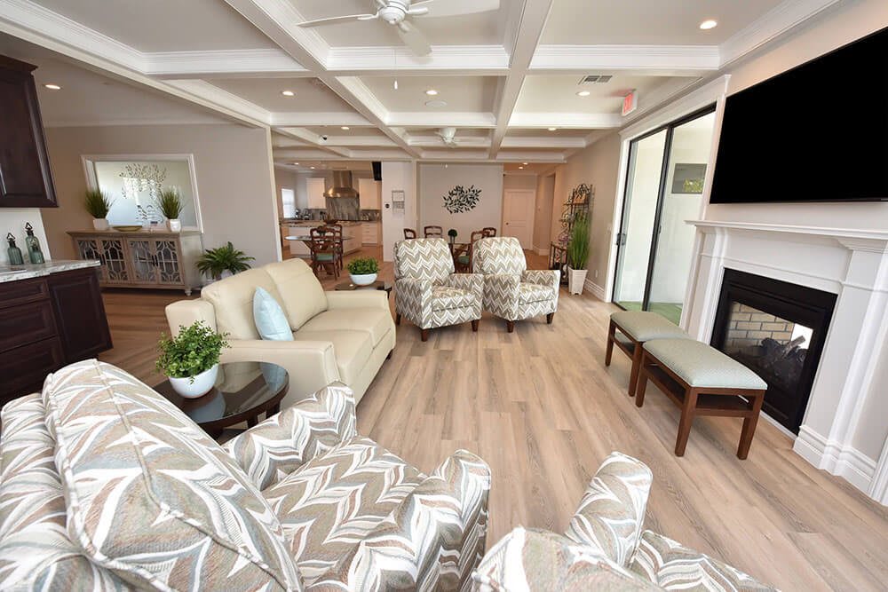 A modern and cozy living room with elegant furniture and open-plan design.