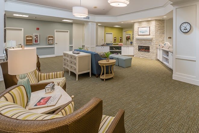 A spacious and well-decorated lobby with comfortable seating and ambient lighting.