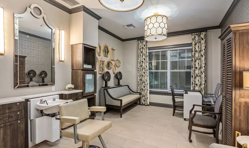 A stylish and modern salon interior with comfortable seating and elegant decor.